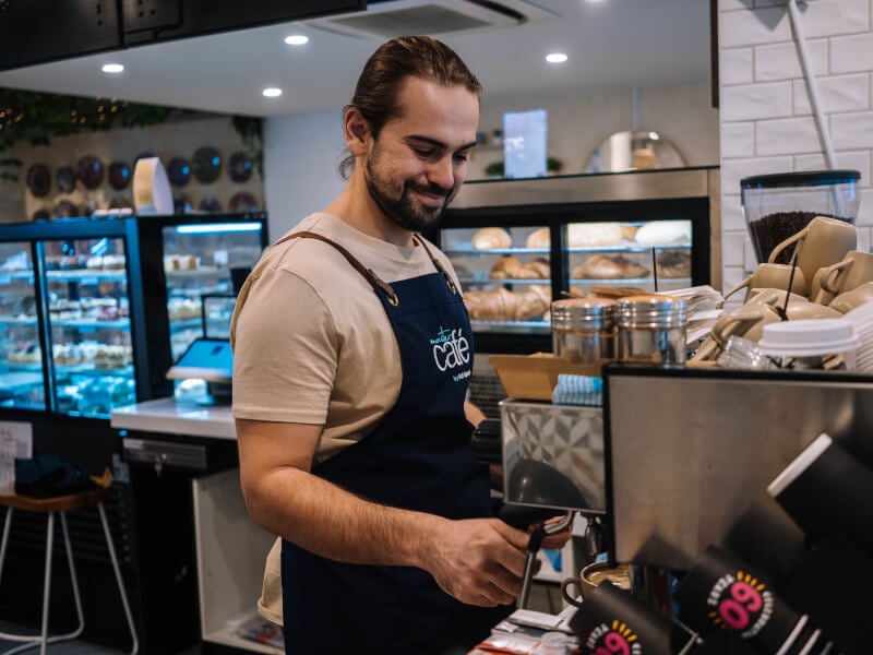barista making coffee